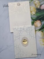 Front-Photo-of-Cream-colour-Textured-White-Padded-card-with-acrylic-name-plate-Wedding-Invitation-Card-SK-3329-1.jpg