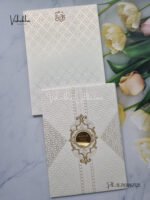Front-Photo-of-Cream-colour-Textured-White-Padded-card-with-acrylic-name-plate-Wedding-Invitation-Card-SK-3433-1.jpg