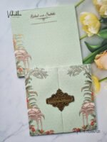 Front-Photo-of-Pista-green-Traditional-double-door-padded-with-name-plate-Wedding-Invitation-Card-SK-3396-1.jpg