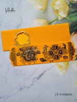 Front-Photo-of-Yellow-Piano-style-paper-Scroll-with-Om-GAnesh-Hindu-marriage-card-1.jpg