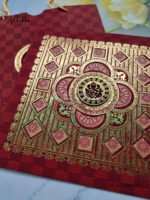 Side-Angle-Of-Carry-bag-Style-Mehroon-and-Gold-wedding-invitation-card-1.jpg
