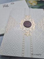 Side-Angle-Of-Cream-colour-Textured-White-with-wooden-name-plate-Wedding-Invitation-Card-SK-3420-1.jpg