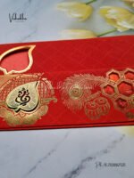 Side-Angle-Of-Red-Piano-style-paper-Scroll-with-Paan-Ganesh-Marriage-invitation-card-1.jpg