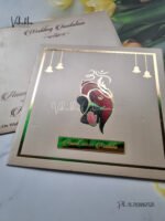 Side-Angle-OfElegant-Shiny-Grey-With-Center-Ganesh-Face-and-Gold-border-Exclusive-Hindu-Wedding-Card-1.jpg