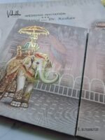 Side-Angle-Of-Barat-Semi-Box-Hathi-Dulah-Dulhan-Double-Door-Hindu-Padded-invitation-Cards-EJ-4018-1.jpg