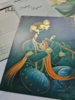 Side-Angle-Of-Radha-Krishna-Peacock-Double-Door-Hindu-invitation-Cards-EJ-4125-1.jpg