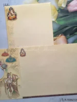 Full-Internal-View-Of-Radha-Krishna-Peacock-Ganesh-Ji-Hindu-Light-Brown-And-Blue-Colored-wedding-invitation-Cards-GS-5035-1.webp